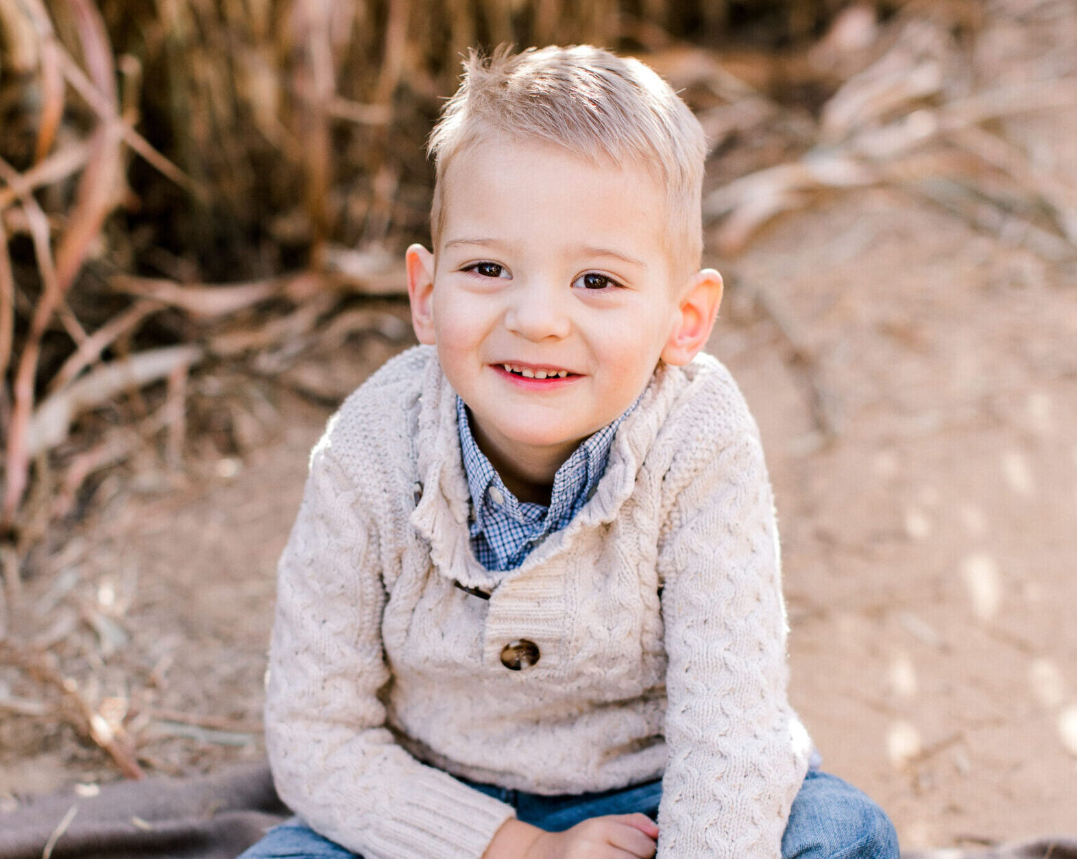 A happy boy smiling affected by Leigh syndrome